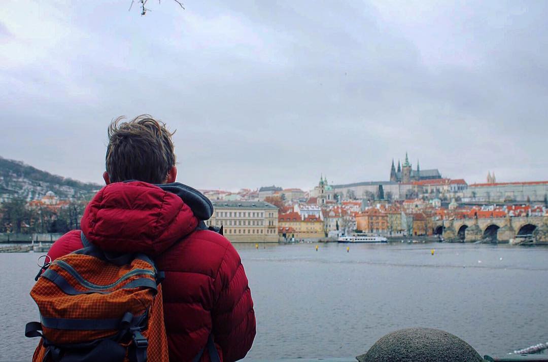 Boy with red jacket in Prague