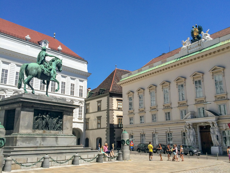 statue in bright square vienna