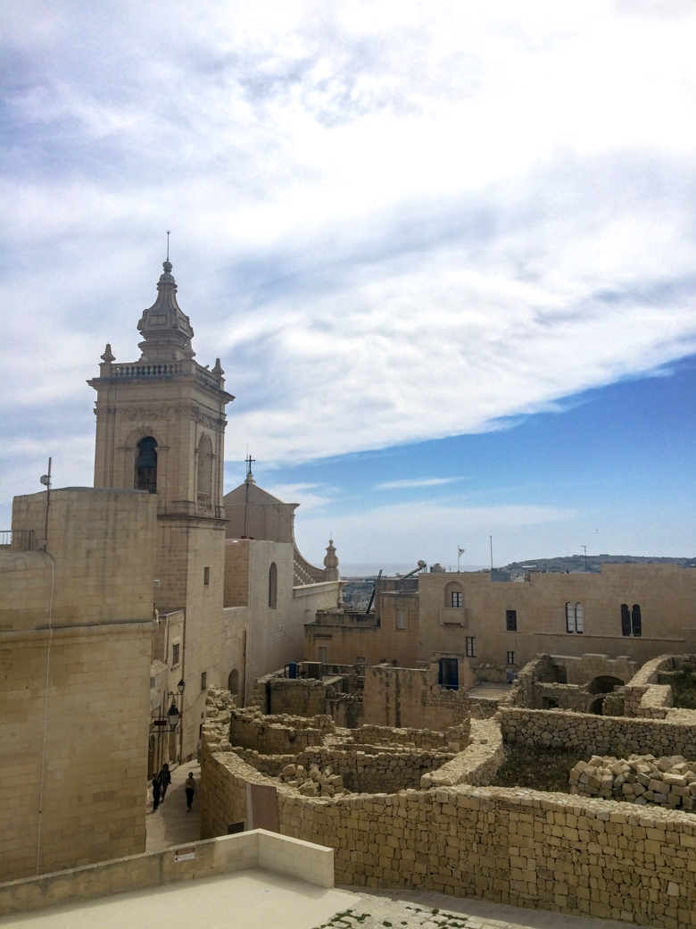 old sandstone citadel in malta with blue sky