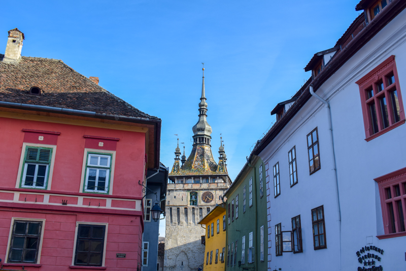 sighisoara tower with colourful houses