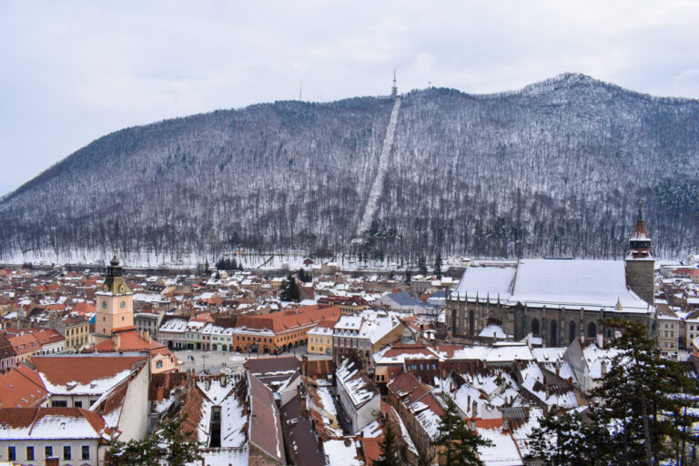 old town brasov red roofs with snow high vantage shot