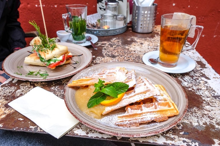 waffles and panini on plates on cafe table Café Wunschlos Glücklich wurzburg
