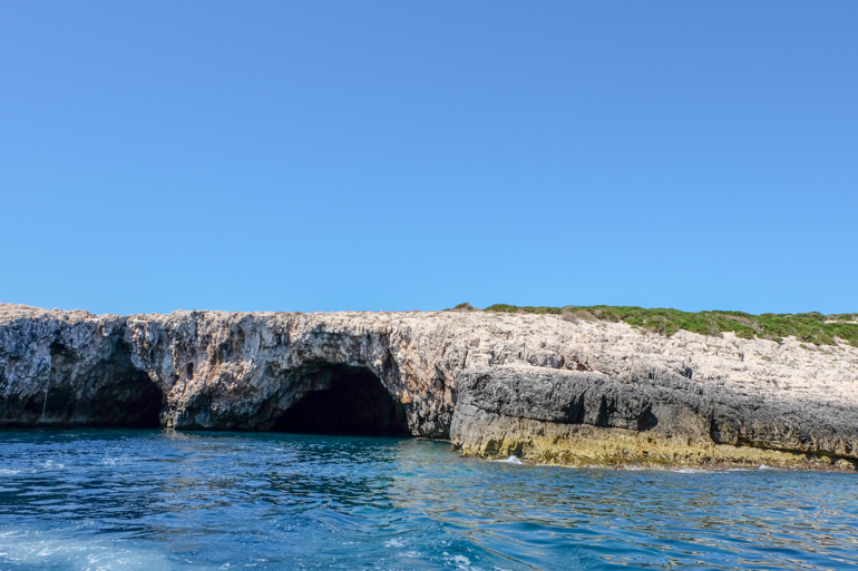 cave opening on rock face in croatia island hopping