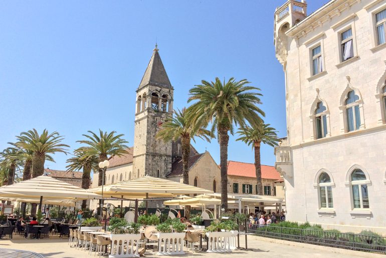 old town tower with restaurants on trogir on day trips from split