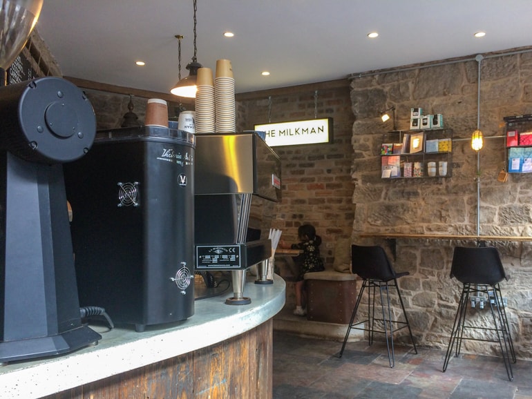 inside of coffee shop in edinburgh wooden walls and stools coffee shops in edinburgh