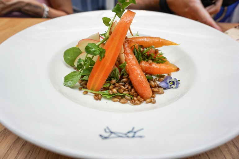 carrots and food on white plate ireland travel tips