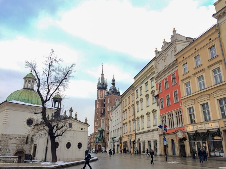 colourful buildings and red brick church in old town krakow 3 days itinerary