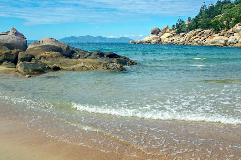 Blue Water brown beach and rocks magnetic island Australia best places to visit