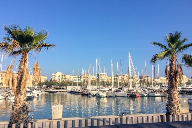 boats in blue harbour barcelona spain itinerary