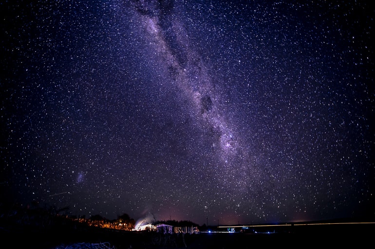 starry night sky with reflective ground experiences of a lifetime atacama desert