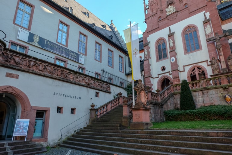 stone staircase of fancy church and museum things to do in aschaffenburg Stiftsmuseum
