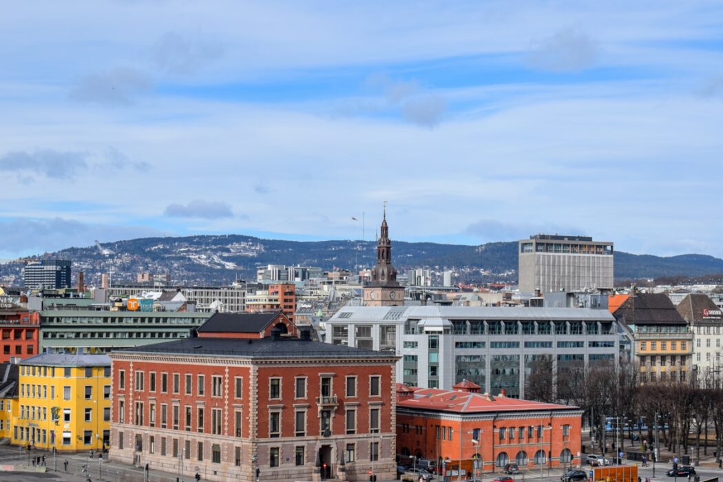 colourful buildings and blue sky sentrum things to do in oslo norway