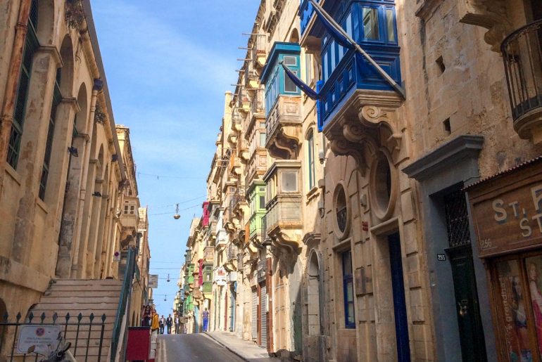 colourful window shutters and narrow stone streets things to do in valletta malta