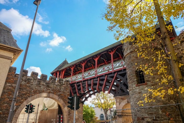 wooden archway bridge and stone arch entrance things to do in wiesbaden