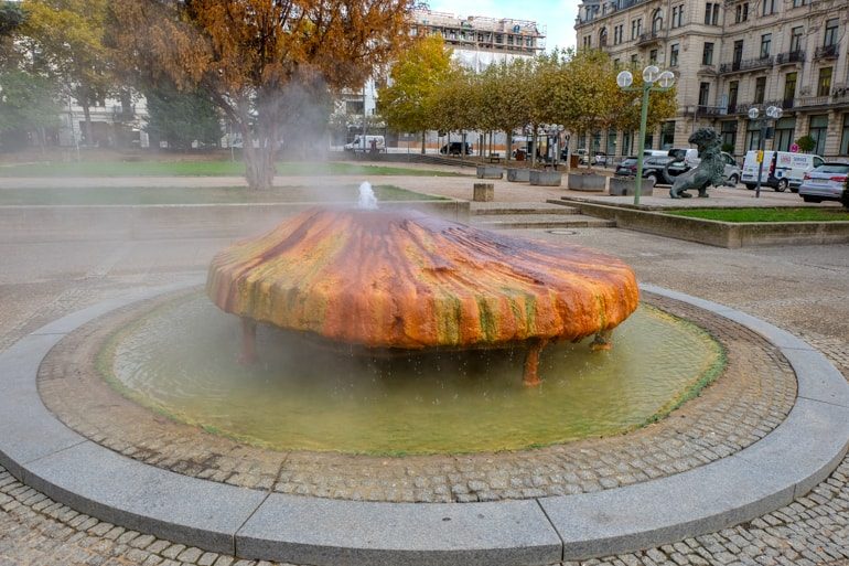 orange circle thermal mineral fountain with water dripping things to do in wiesbaden