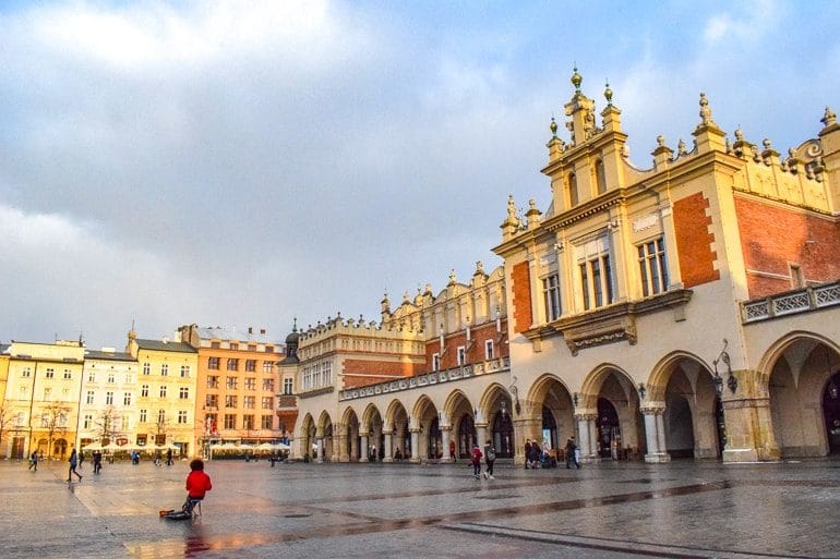 orange market hall in old town public square where to stay in krakow