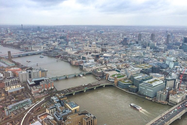 views of river and city below from high up in tower shard london