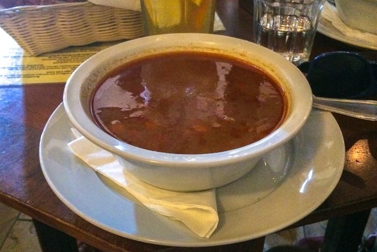 hungarian soup on table in bowl with bread