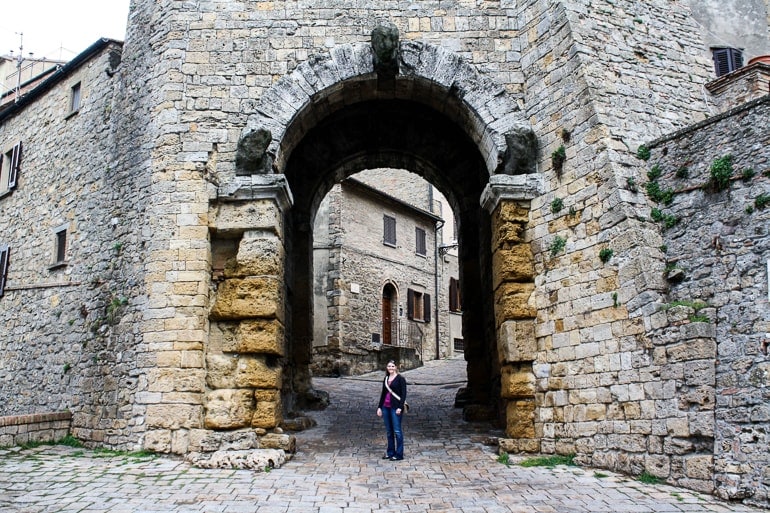 old stone archway in old town italy