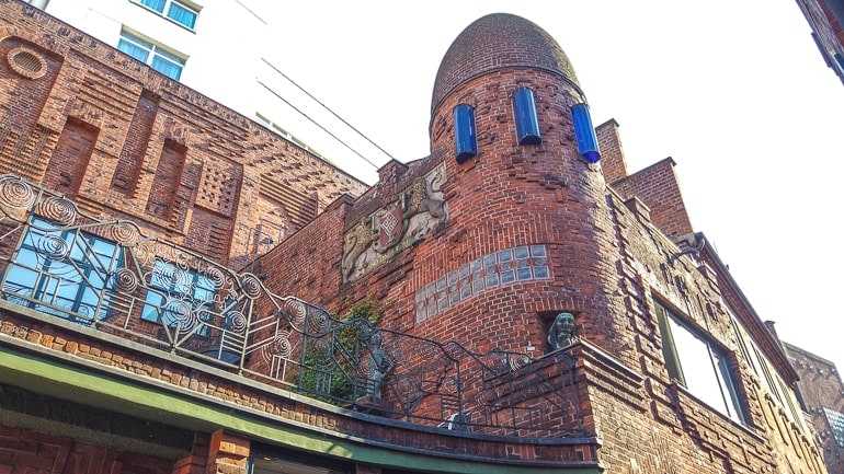red brick tower in old town alleyway museum bremen