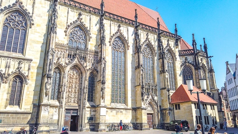 cathedral windows with red roof in old town square munster germany