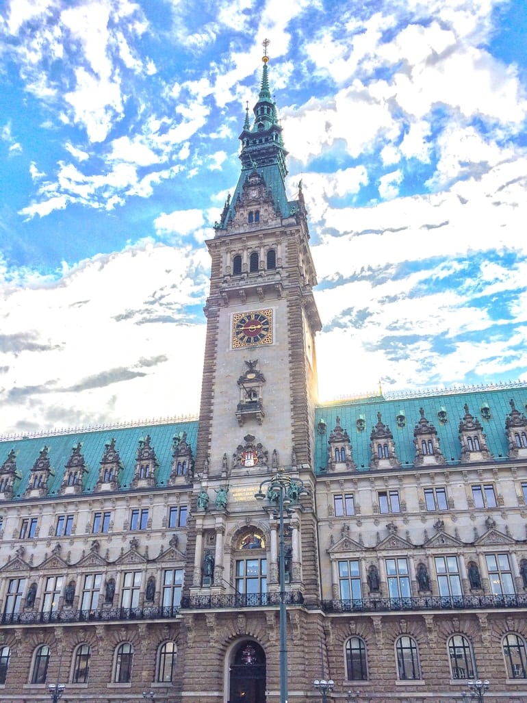 old german town hall with clock tower where to stay in hamburg altstadt