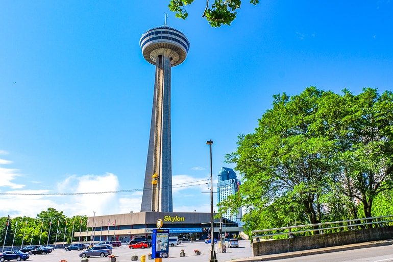 tan tower with observation deck and parking lot below skylon tower niagara falls things to do