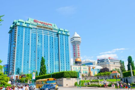 blue glass hotel with casino beside in niagara falls where to stay