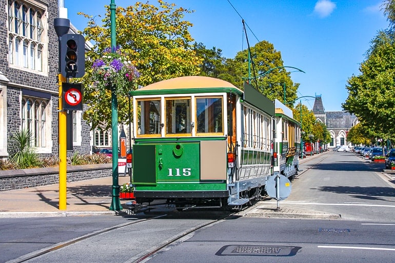 old street car on roadway in city in new zealand