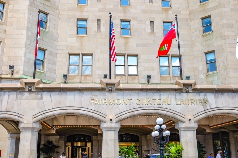 gold lettering of hotel entrance with flags chateau laurier ottawa luxury hotel