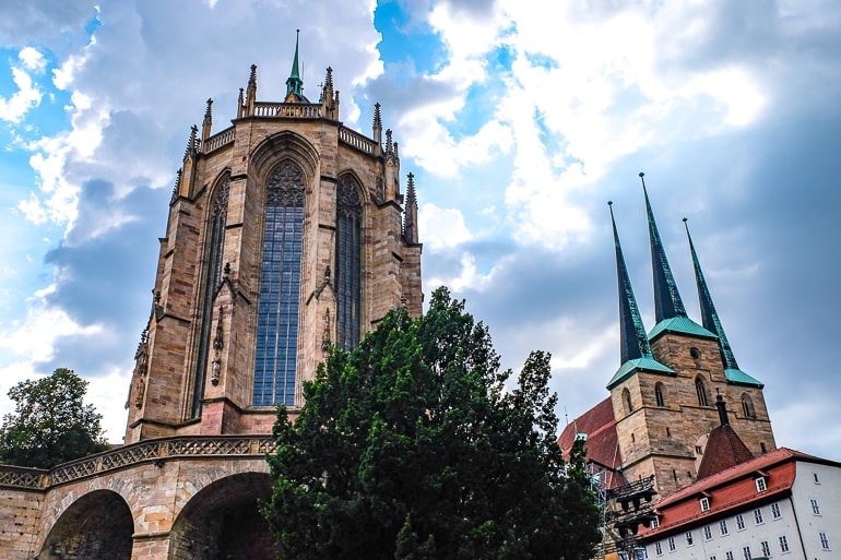 large cathedral and church with windows and spires from below erfurt germany