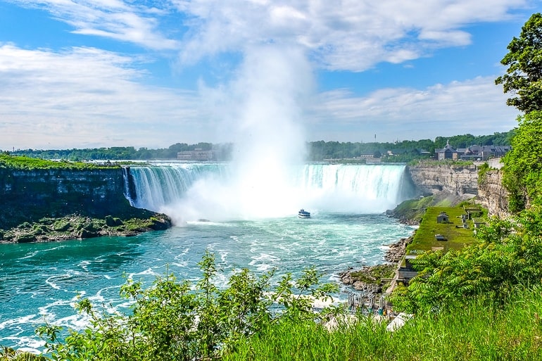 waterfalls with boat approaching and mist day trips from toronto niagara falls