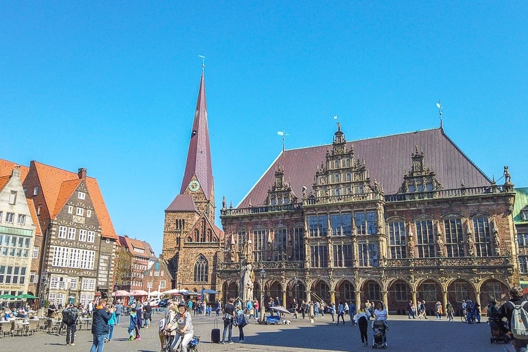 historic town hall and church tower in bremen town square