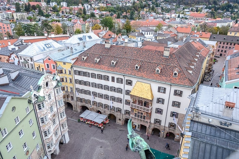 golden roof and old buildings seen from above in tower.