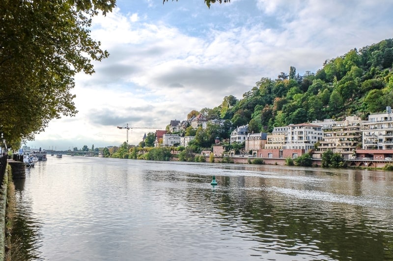 views of buildings and accommodations along neckar river in heidelberg germany