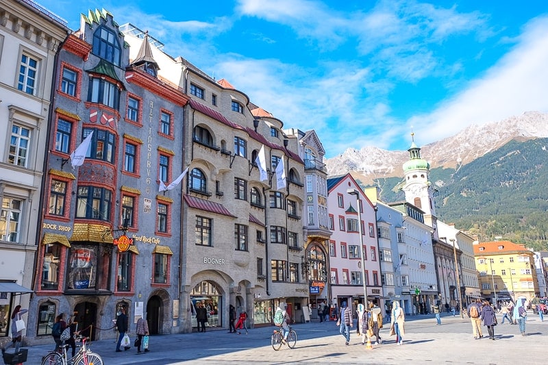 old town buildings with shoppers in front in innsbruck innenstadt