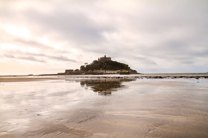 st michaels mount island surrounded by water in cornwall
